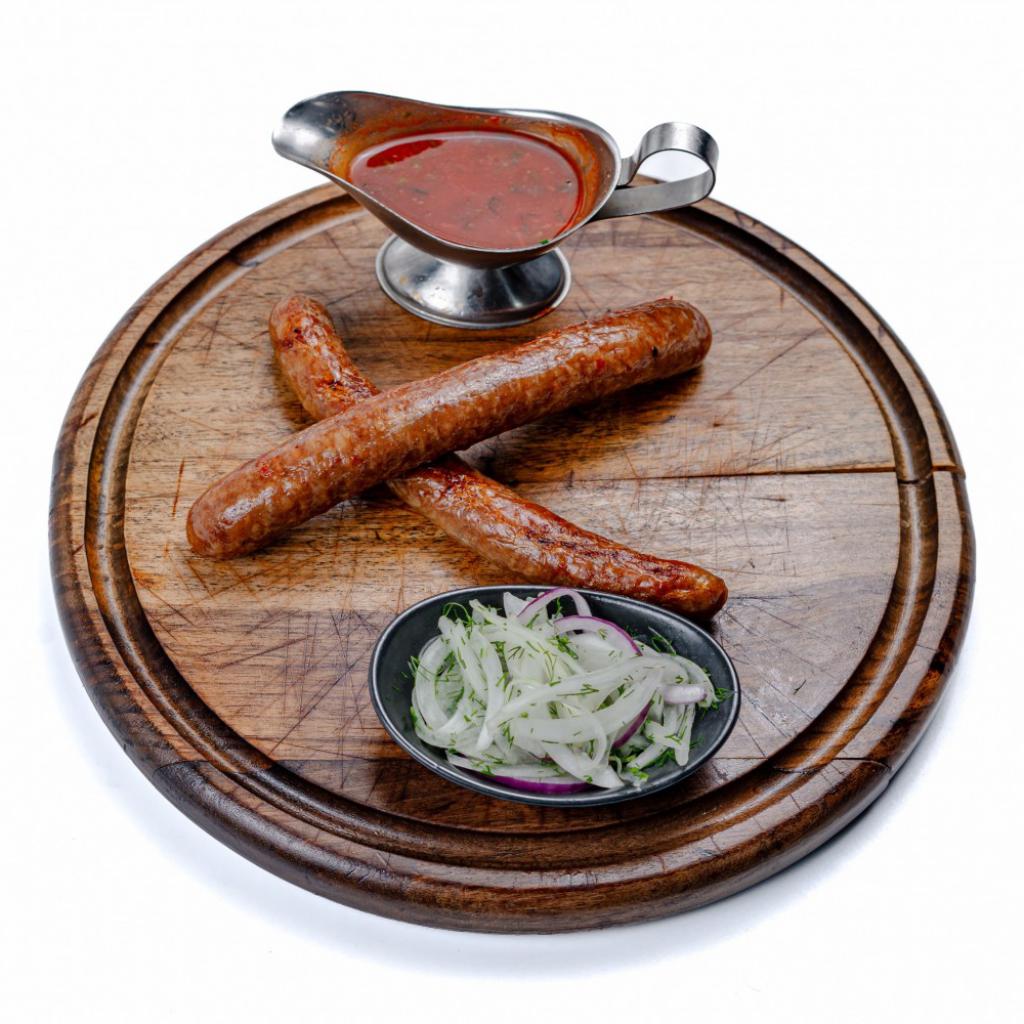 Grilda pishirilgan mol go'shti kolbasalari, 1 dona, 100 g